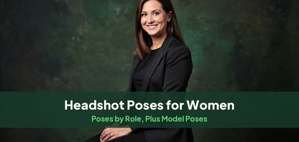 A smiling woman in a black blazer seated on a stool, for a guide to headshot poses for women