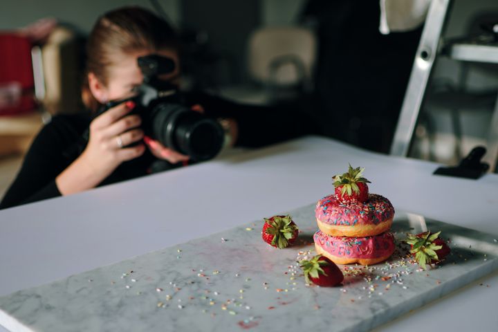 professional photographer doing food product photography